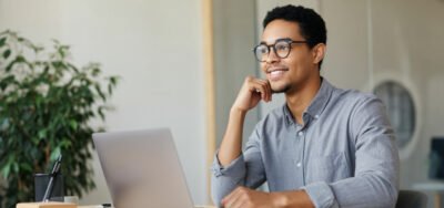 A happy professional working in a value-aligned job
